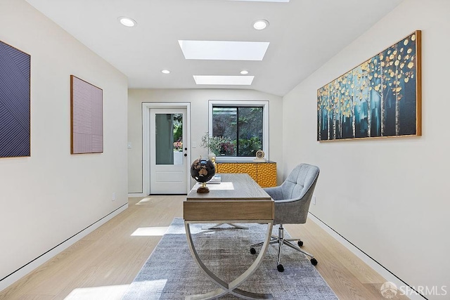 1098 Siler Pl, Berkeley, CA 94705 - office with light wood-type flooring, a skylight, vaulted ceiling, baseboards, and recessed lighting