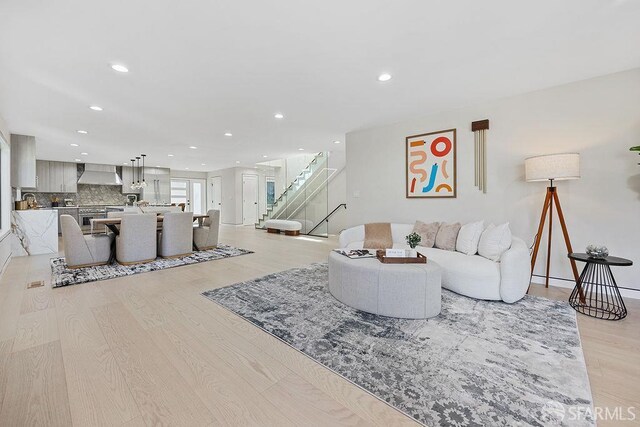 1098 Siler Pl, Berkeley, CA 94705 - living area featuring light wood-style floors, recessed lighting, and stairway