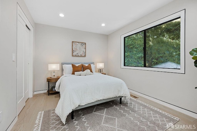 1098 Siler Pl, Berkeley, CA 94705 - bedroom with light wood-type flooring, recessed lighting, and a closet
