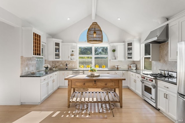 1316 Sulphur Springs Ave, Saint Helena, CA 94574 - kitchen featuring beam ceiling, appliances with stainless steel finishes, white cabinetry, wall chimney exhaust hood, and open shelves