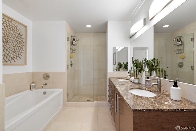 301 Main St Unit 34B, San Francisco, CA 94105 - bathroom with double vanity, a shower stall, a bath, tile patterned floors, and recessed lighting