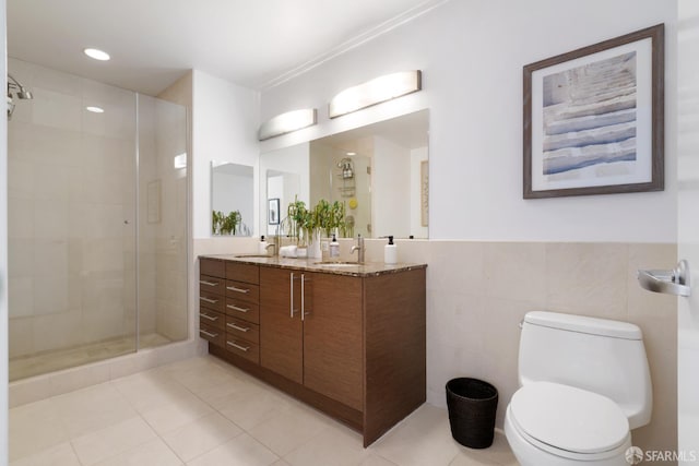 301 Main St Unit 34B, San Francisco, CA 94105 - bathroom with double vanity, a stall shower, tile patterned flooring, and tile walls