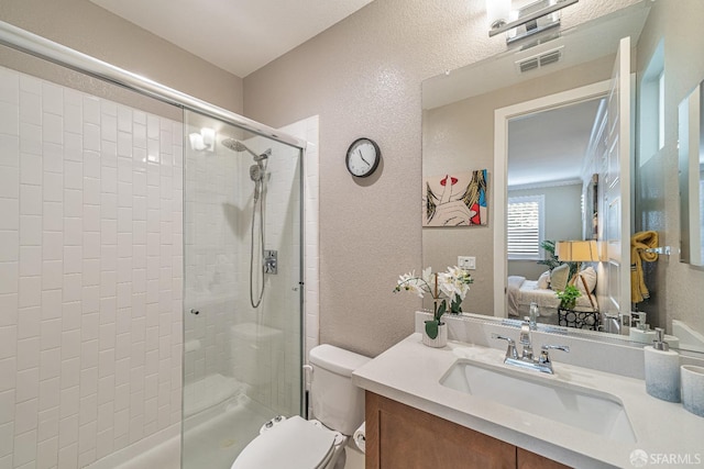 7240 Carneros Ln, Dublin, CA 94568 - bathroom featuring a textured wall, a stall shower, vanity, and ensuite bath