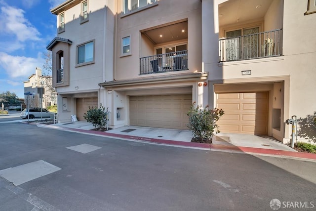 2702 Urbino Ct, San Jose, CA 95111 - view of front of home with stucco siding and a garage