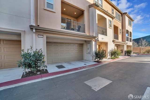 2702 Urbino Ct, San Jose, CA 95111 - view of front of house with stucco siding and a garage