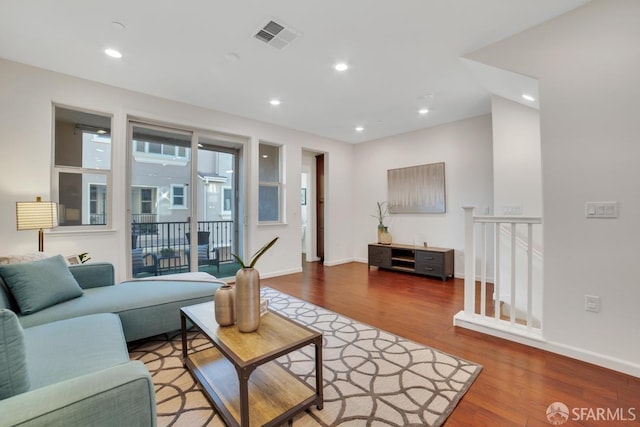 2702 Urbino Ct, San Jose, CA 95111 - living area with wood finished floors, baseboards, and recessed lighting