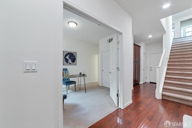 2702 Urbino Ct, San Jose, CA 95111 - hallway featuring dark wood-style flooring, stairs, baseboards, a desk, and recessed lighting