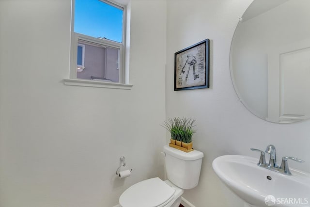 2702 Urbino Ct, San Jose, CA 95111 - bathroom featuring a sink, toilet, and baseboards