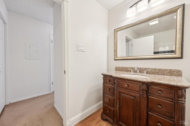 1201 Glen Cove Pkwy Unit 514, Vallejo, CA 94591 - bathroom with vanity, baseboards, and ornamental molding