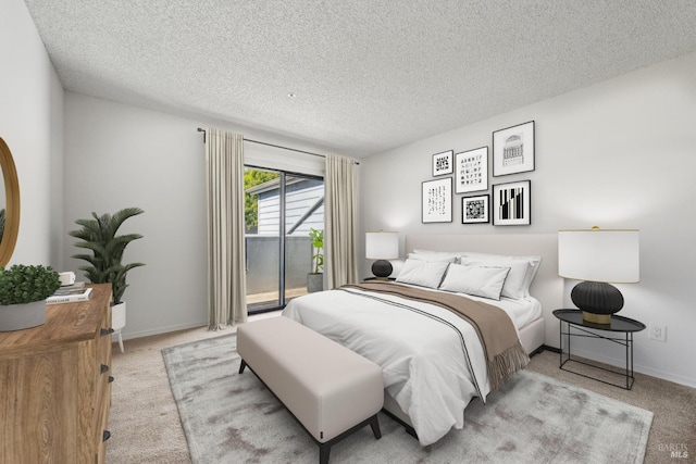 1201 Glen Cove Pkwy Unit 514, Vallejo, CA 94591 - bedroom with access to exterior, carpet floors, a textured ceiling, and baseboards