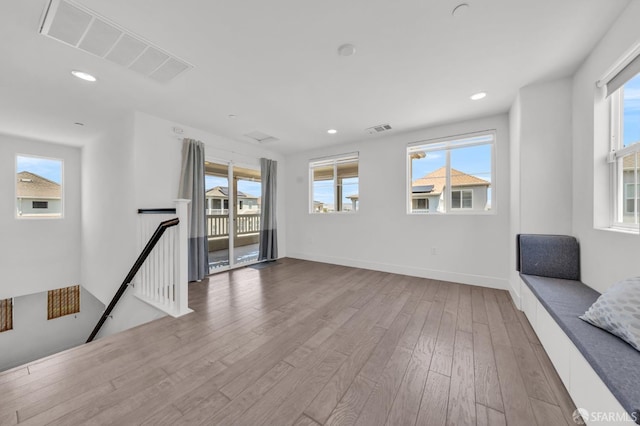 8534 Jetty Way, Newark, CA 94560 - spare room with wood finished floors, healthy amount of natural light, recessed lighting, and baseboards