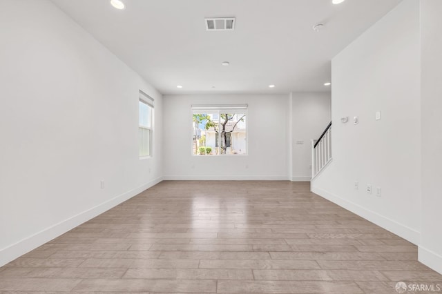 8534 Jetty Way, Newark, CA 94560 - unfurnished room featuring stairs, recessed lighting, light wood-style flooring, and baseboards