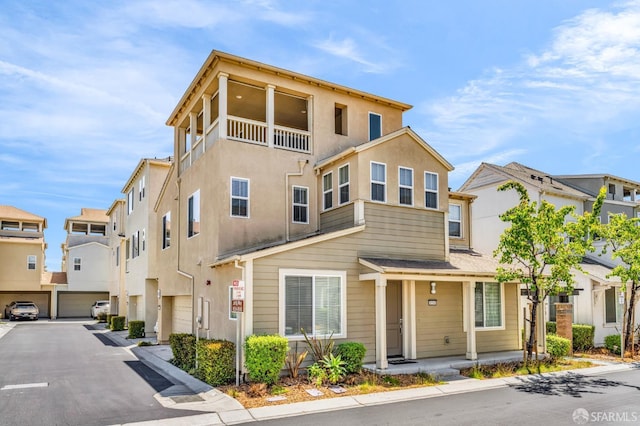8534 Jetty Way, Newark, CA 94560 - view of property featuring a residential view and a garage