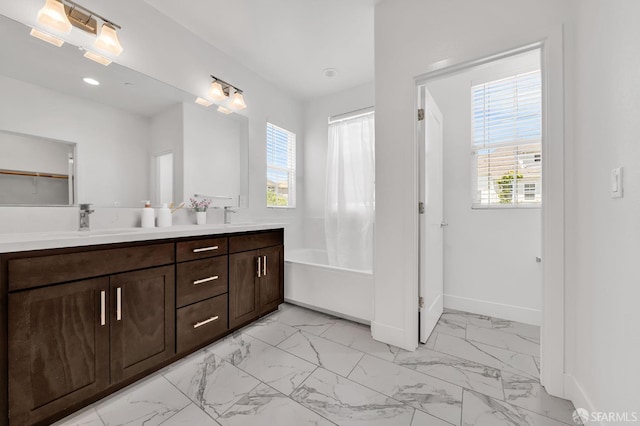 8534 Jetty Way, Newark, CA 94560 - bathroom featuring marble look tiles, double vanity, a tub to relax in, a shower with curtain, and baseboards