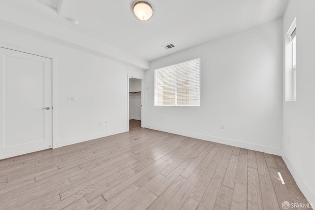 8534 Jetty Way, Newark, CA 94560 - unfurnished room featuring light wood-style floors, plenty of natural light, and baseboards