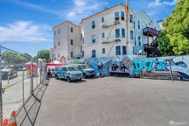 3230-3236 24th St, San Francisco, CA 94110 - view of building exterior featuring uncovered parking