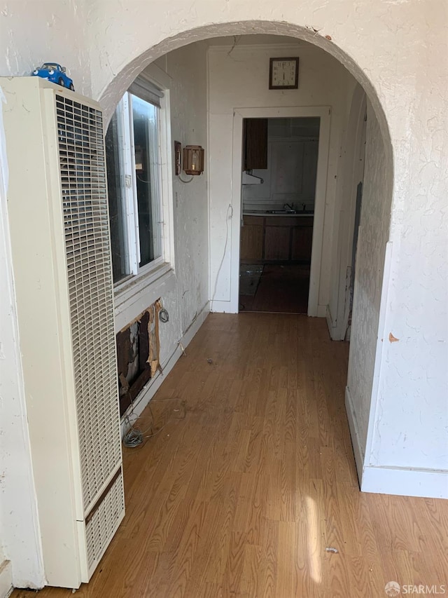 hallway featuring light hardwood / wood-style floors