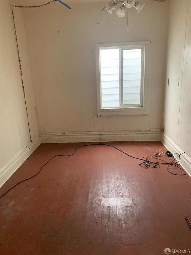 spare room with light hardwood / wood-style flooring