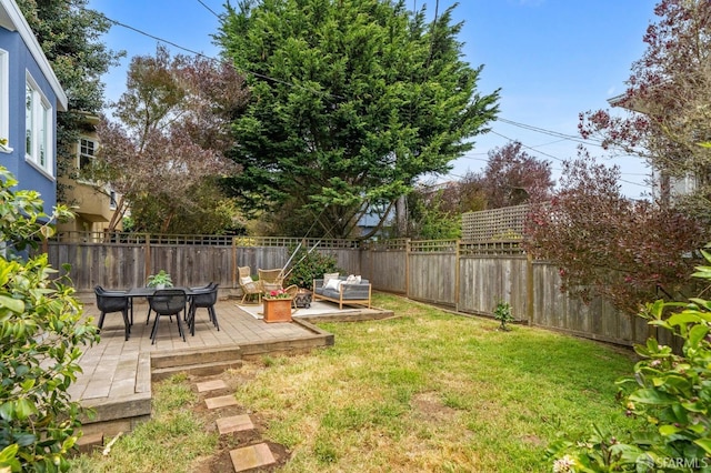 view of yard with a fenced backyard