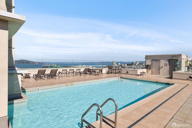 community pool with a patio