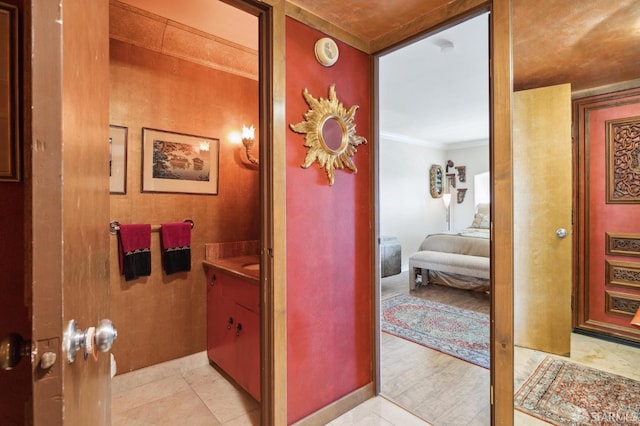 hallway featuring crown molding