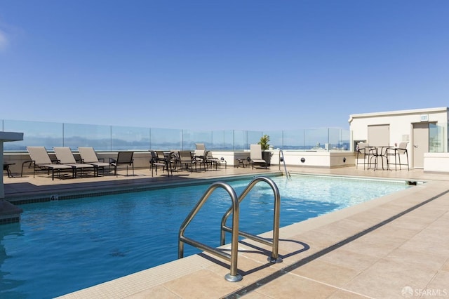 pool featuring a patio