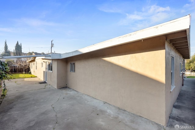 view of home's exterior featuring a patio area