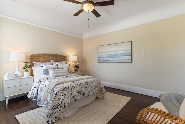 bedroom featuring ornamental molding, dark hardwood / wood-style floors, and ceiling fan