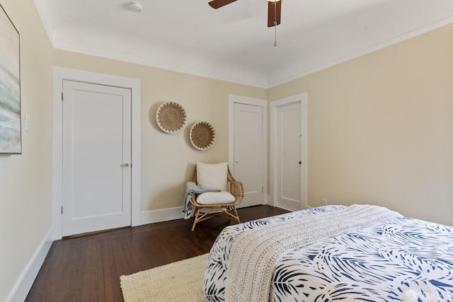 bedroom featuring dark hardwood / wood-style flooring and ceiling fan