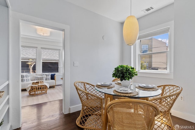 dining room featuring dark hardwood / wood-style floors