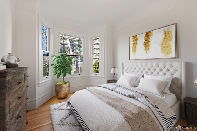 bedroom with light wood-type flooring