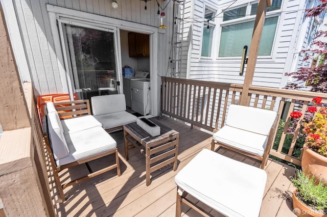 wooden terrace with washer and dryer