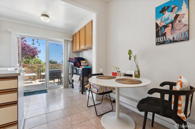 dining space with light tile patterned floors