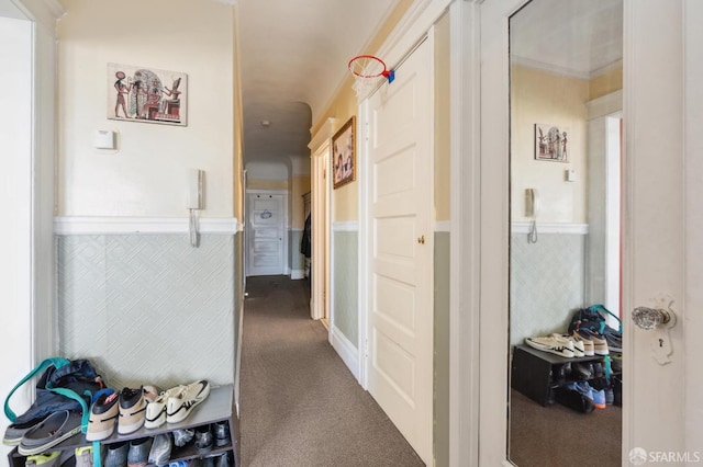 hallway featuring carpet floors