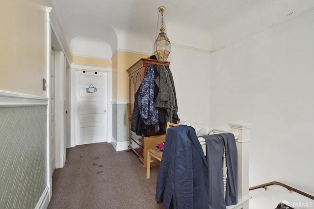 interior space with dark colored carpet