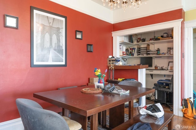 dining area featuring a notable chandelier