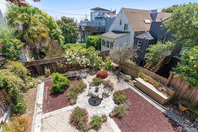 exterior space with a patio area and an outdoor fire pit