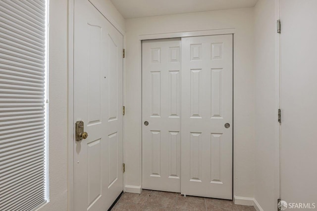3587 Fitzsimmons Cmn, Fremont, CA 94538 - doorway featuring baseboards and light tile patterned flooring