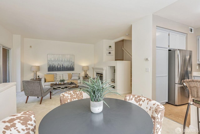 3587 Fitzsimmons Cmn, Fremont, CA 94538 - dining area featuring light wood-style floors