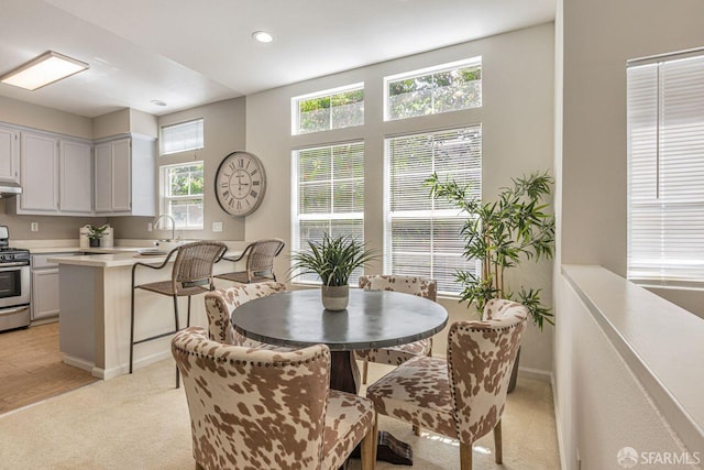 3587 Fitzsimmons Cmn, Fremont, CA 94538 - dining room featuring light carpet and recessed lighting