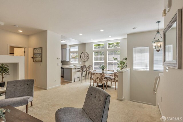 3587 Fitzsimmons Cmn, Fremont, CA 94538 - living area featuring light carpet and recessed lighting