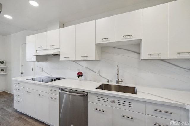 kitchen featuring stainless steel dishwasher, black electric stovetop, sink, and white cabinets