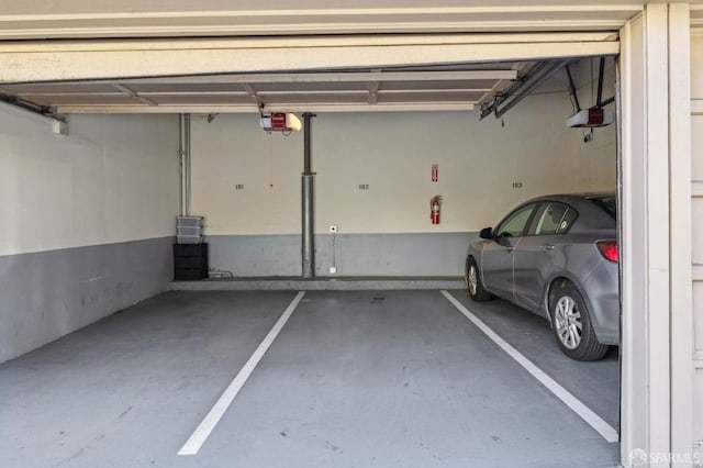 garage featuring a garage door opener