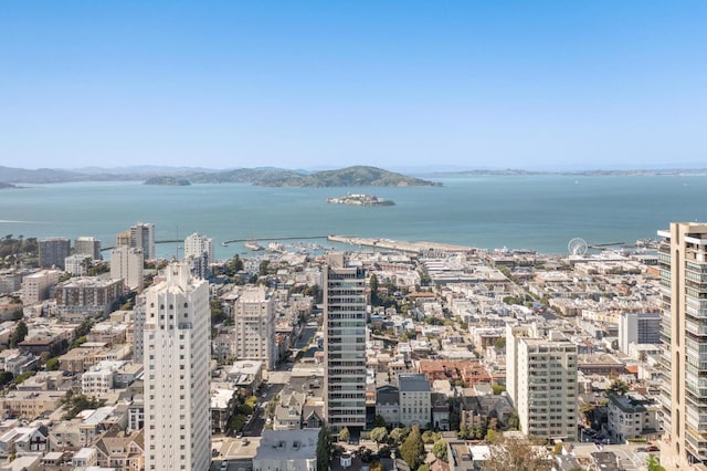 bird's eye view with a water and mountain view