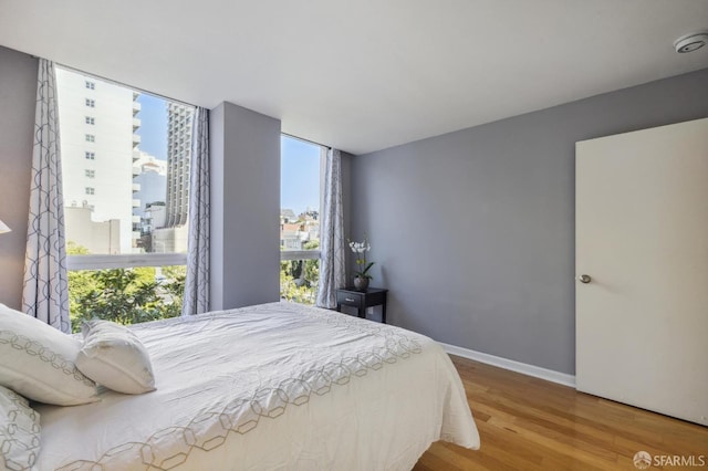 bedroom featuring hardwood / wood-style flooring