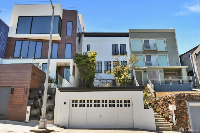 224 Twin Peaks Blvd, San Francisco, CA 94114 - view of property with a garage, stairs, and driveway