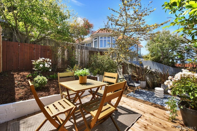 224 Twin Peaks Blvd, San Francisco, CA 94114 - fenced backyard with a wooden deck and outdoor dining space