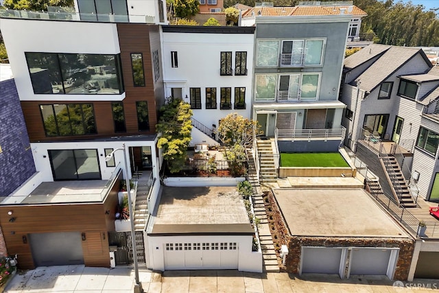 224 Twin Peaks Blvd, San Francisco, CA 94114 - view of building exterior with stairs, a garage, and a residential view