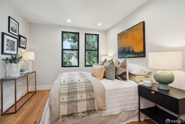 bedroom featuring light wood-type flooring