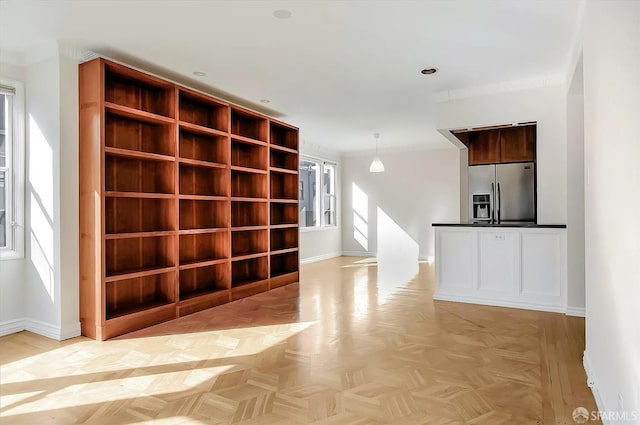 interior space featuring baseboards